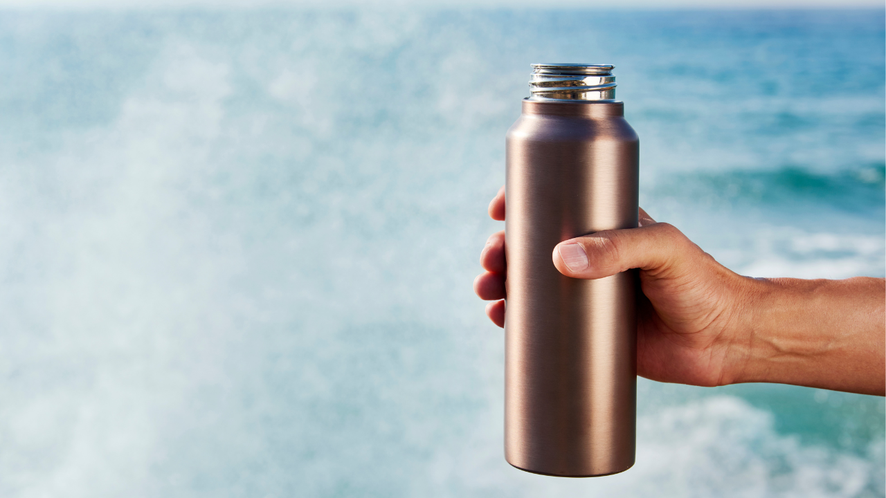 a reusable water bottle, sustainable travel